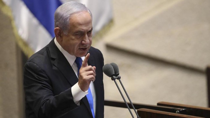 Israels outgoing prime minister Benjamin Netanyahu speaks during a Knesset session in Jerusalem Sunday, June 13, 2021. Bennett is expected later Sunday to be sworn in as the countrys new prime minister, ending Prime Minister Benjamin Netanyahus 12-year rule. (AP Photo/Ariel Schali22