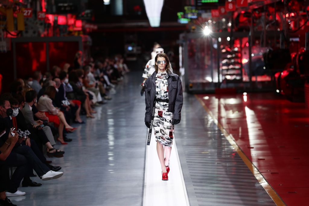 MARANELLO, ITALY - JUNE 13:  A model walks the runway at the fashion debut of the first co-ed Ferrari collection at Ferrari Factory on June 13, 2021 in Maranello, Italy. (Photo by Vittorio Zunino Celotto/Getty Images)