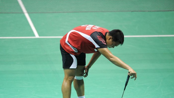 Markis Kido Markis Kido of Indonesia reacts to losing point with his partner Hendra Setiawan against Hirokatsu Hashimoto and Noriyasu Hirata of Japan during their quarterfinals at the Thomas Cup world badminton team championships in Chinas central city of Wuhan, in Hubei province on May 23, 2012. Japan defeated Indonesia to advance to the semifinals. AFP PHOTO / LIU JIN (Photo by LIU JIN / AFP)