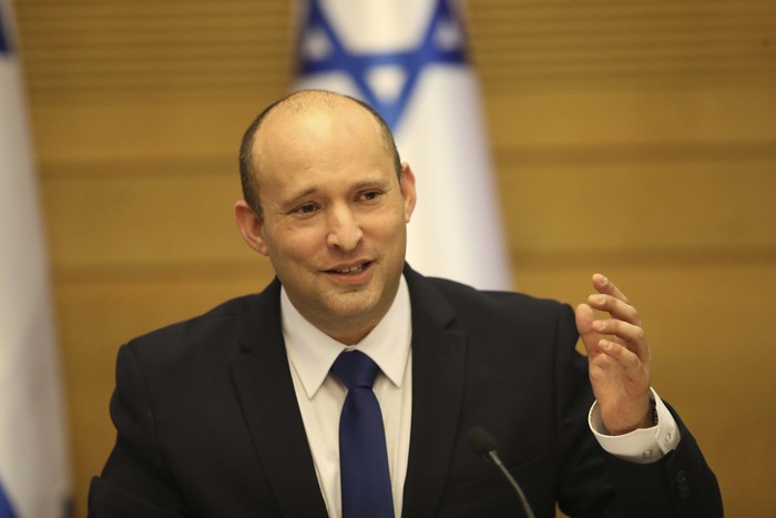 Israels new prime minister Naftali Bennett holds a first cabinet meeting in Jerusalem Sunday, June 13, 2021. Israels parliament has voted in favor of a new coalition government, formally ending Prime Minister Benjamin Netanyahus historic 12-year rule. Naftali Bennett, a former ally of Netanyahu became the new prime minister (AP Photo/Ariel Schalit)