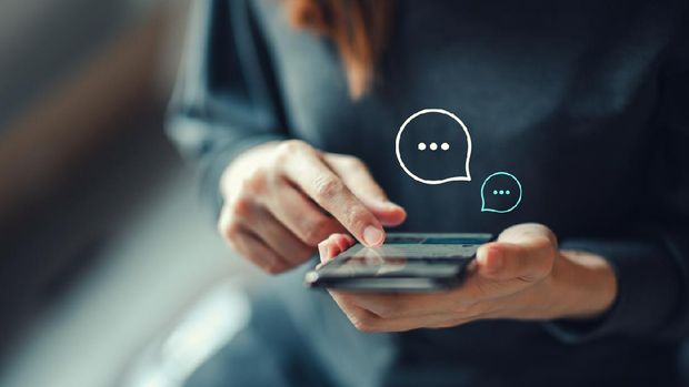 Women's hand typing on mobile smartphone, Live Chat Chatting on application Communication Digital Web and social network Concept. Work from home.