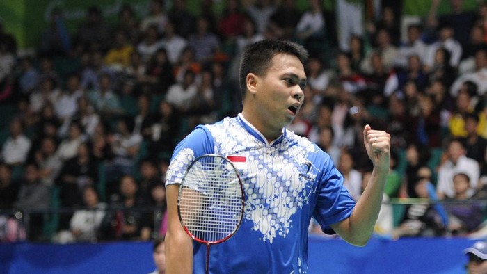 Markis Kido Markis Kido of Indonesia reacts to a winning point with his partner Hendra Setiawan (not pictured) against Koo Kien Keat and Tan Boon Heong of Malaysia during their mens doubles badminton final match against at the 16th Asian Games in Guangzhou on November 20, 2010. Indoneisa won 16-21, 26-24, 21-19 to take the gold. AFP PHOTO / LIU JIN (Photo by LIU JIN / AFP)