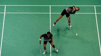 Dalam kariernya di bulutangkis, Markis Kido identik dengan nomor ganda putra. Ini aksinya, bersama Hendra Setiawan, di Olimpiade 2008. (Foto: Getty Images/Harry How)