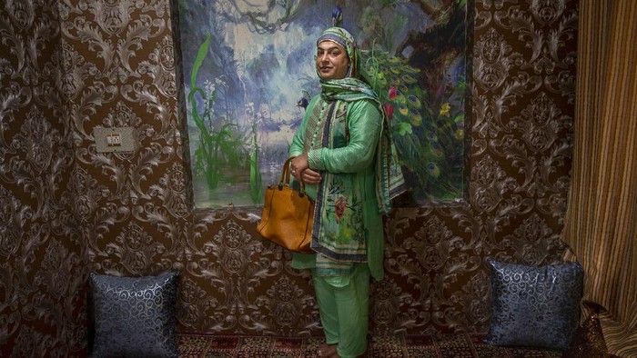 A transgender Kashmiri Shabana Pallo, also one of the gurus, speaks during a special meet of community members in Srinagar, Indian controlled Kashmir, Thursday, June 3, 2021. Life has not been easy for many of Kashmir's transgender people. Most are ostracized by families and bullied in society. They face domestic abuse and end up running away from families at an early age. Many are often only able to find work as matchmakers or wedding entertainment. (AP Photo/ Dar Yasin)
