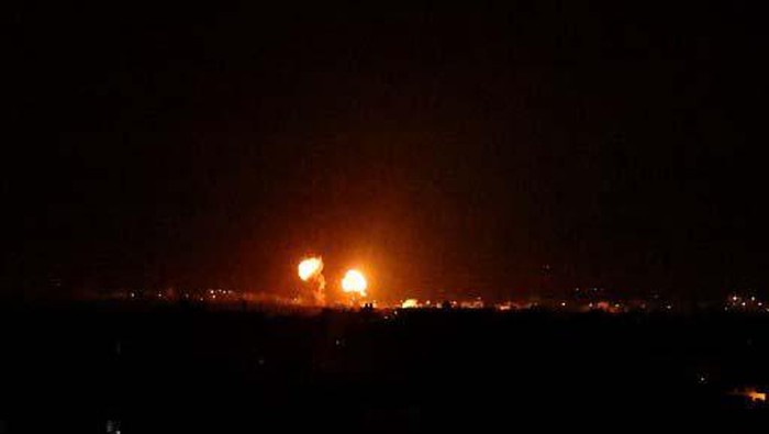 Explosions light-up the night sky at Khan Yunis in the southern Gaza Strip, as Israeli forces shell the Palestinian enclave, early on June 16, 2021. (Photo by SAID KHATIB / AFP)
