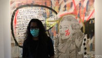 Traveler yang mau lihat karyanya tetap harus menjalankan protokol kesehatan dengan menggunakan masker, ya. (Wisma Putera/detikcom)