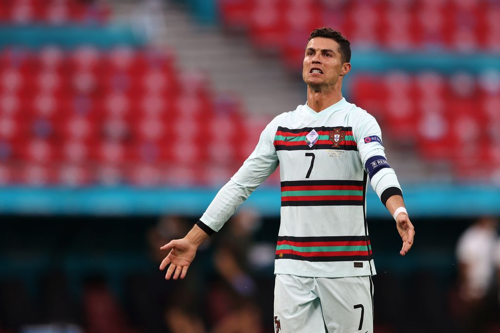 BUDAPEST, HUNGARY - JUNE 15: Cristiano Ronaldo of Portugal celebrates after victory in the UEFA Euro 2020 Championship Group F match between Hungary and Portugal at Puskas Arena on June 15, 2021 in Budapest, Hungary. (Photo by Alex Pantling/Getty Images)
