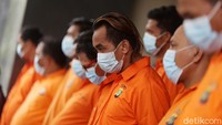 Mereka melakukan tindakan pungli terhadap perusahaan jasa ekspedisi.