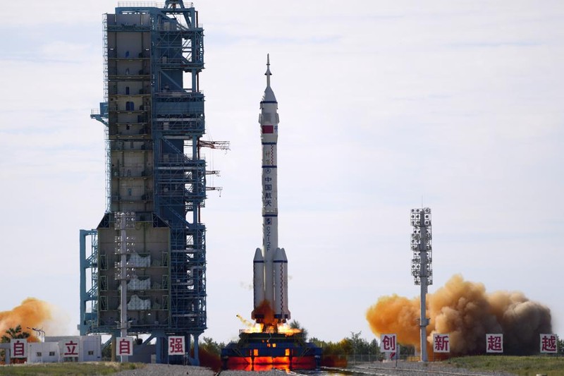 A Long March-2F Y12 rocket carrying a crew of Chinese astronauts in a Shenzhou-12 spaceship lifts off at the Jiuquan Satellite Launch Center in Jiuquan in northwestern China, Thursday, June 17, 2021. China has launched the first three-man crew to its new space station in its the ambitious programs first crewed mission in five years. (AP Photo/Ng Han Guan)
