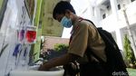 Uji Coba Sekolah Tatap Muka di Tengah Melonjaknya COVID-19