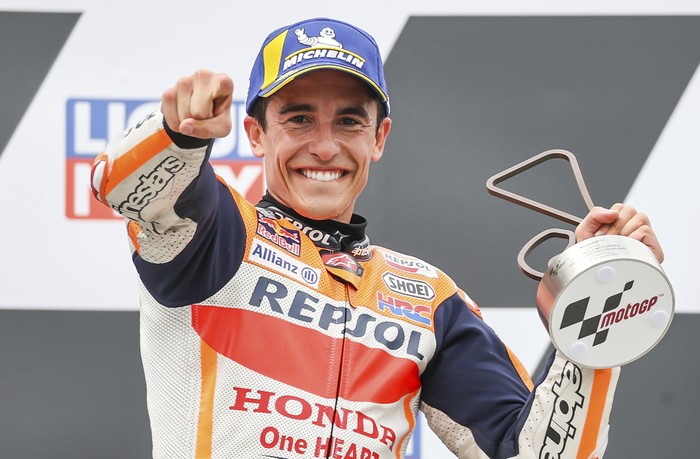Rider Marc Marquez from Spain of the Repsol Honda Team reacts after winning the Moto GP race at the Sachsenring circuit in Hohenstein-Ernstthal, Germany, Sunday, June 20, 2021. (Jan Woitas/dpa via AP)
