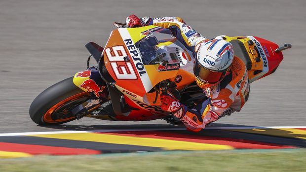 Spain's Marc Marquez of Repsol Honda Team, speeds at a free training session of the MotoGP in Hohenstein-Ernstthal, Germany, Friday, June 18, 2021. (Jan Woitas/dpa via AP)