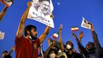 Sorak Sorai Warga Iran Rayakan Kemenangan Ebrahim Raisi