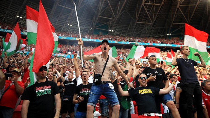 BUDAPEST, HUNGARY - JUNE 19: Fans of Hungary celebrate their first goal during the UEFA Euro 2020 Championship Group F match between Hungary and France at Puskas Arena on June 19, 2021 in Budapest, Hungary. (Photo by Alex Pantling/Getty Images)