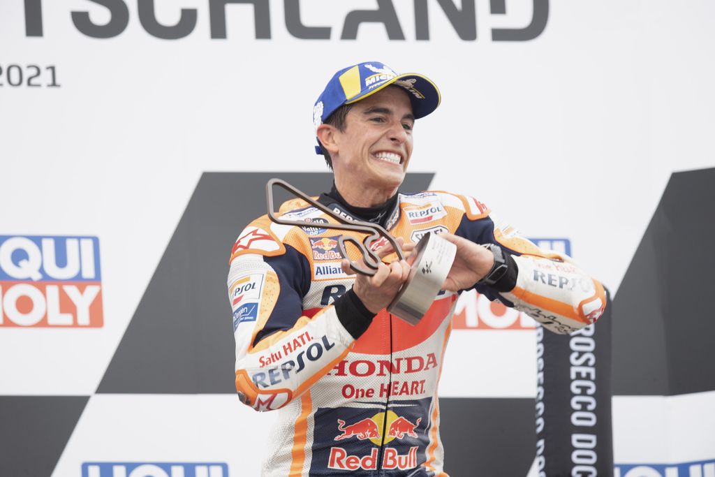 HOHENSTEIN-ERNSTTHAL, GERMANY - JUNE 20: Marc Marquez of Spain and Repsol Honda Team celebrates the victory on the podium during the MotoGP race during the MotoGP of Germany - Race at Sachsenring Circuit on June 20, 2021 in Hohenstein-Ernstthal, Germany. (Photo by Mirco Lazzari gp/Getty Images)