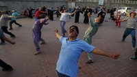 Biasanya Hari Yoga Internasional diperingati dengan melakukan yoga bersama di alam terbuka. AP Photo/K.M. Chaudary  