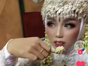 Dandan Cantik, Pengantin Ini Malah Makan dengan Gaya Duduk ala Warteg
