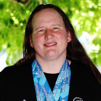 Laurel Hubbard yang terlahir sebagai pria memulai transformasinya sebagai transgender wanita pada 2012. Dia sudah berkompetisi sebagai atlet angkat besi sebelum menjadi transgender. Foto: Getty Image