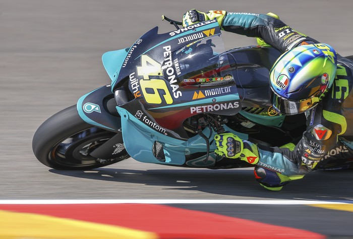 Italian Valentino Rossi of Petronas Yamaha SRT speeds at a free training session of the MotoGP  in Hohenstein-Ernstthal, Germany, Friday, June 18, 2021. (Jan Woitas/dpa via AP)
