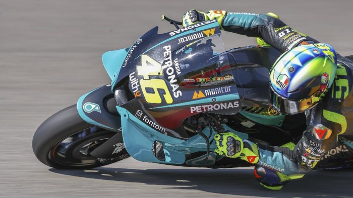 Italian Valentino Rossi of Petronas Yamaha SRT speeds at a free training session of the MotoGP  in Hohenstein-Ernstthal, Germany, Friday, June 18, 2021. (Jan Woitas/dpa via AP)