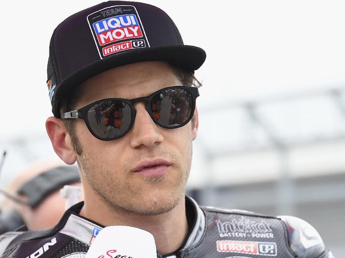 HOHENSTEIN-ERNSTTHAL, GERMANY - JUNE 20:  Marcel Schrotter of Germany and Liqui Moly Intact GP speaks with journalists on the grid during the Moto2 race during the MotoGP of Germany - Race at Sachsenring Circuit on June 20, 2021 in Hohenstein-Ernstthal, Germany. (Photo by Mirco Lazzari gp/Getty Images)