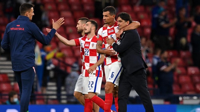 GLASGOW, SCOTLAND - JUNE 22: Zlatko Dalic, Head Coach of Croatia celebrates with Dejan Lovren of Croatia after victory in the UEFA Euro 2020 Championship Group D match between Croatia and Scotland at Hampden Park on June 22, 2021 in Glasgow, Scotland. (Photo by Paul Ellis - Pool/Getty Images)