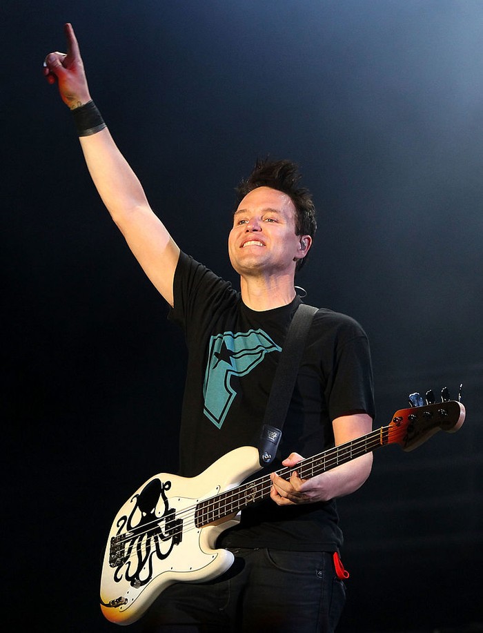 READING, ENGLAND - AUGUST 29:  Mark Hoppus of Blink 182 performs live on the Main stage during the third and final day of Reading Festival on August 29, 2010 in Reading, England.  (Photo by Simone Joyner/Getty Images)