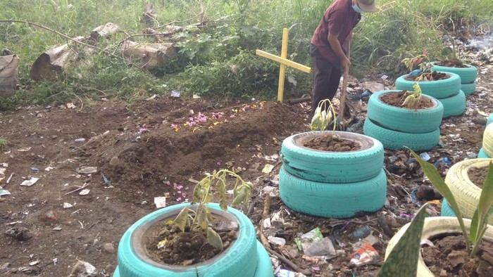 Areal tumpukan sampah di Jalan Bunga Sedap Malam IX, Medan, Sumatera Utara (Sumut)  yang sempat viral kini jadi taman bahkan ada juga kuburan.