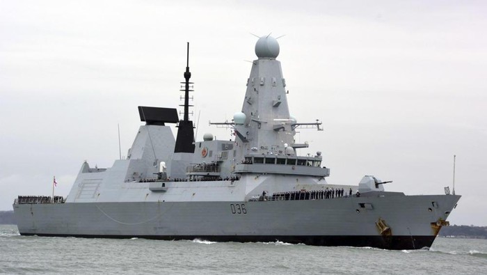 FILE - This March 20, 2020 file photo shows HMS Defender in Portsmouth, England. The Russian military says its warship has fired warning shots and a warplane dropped bombs to force the British destroyer from Russias waters near Crimea in the Black Sea. The incident on Wednesday June 23, 2021, marks the first time since the Cold War era when Moscow used live ammunition to deter a NATO warship, reflecting soaring Russia-West tensions. (Ben Mitchell/PA via AP, File)