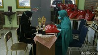 Pembagian rapor yang digelar secara tatap muka itu dilaksanakan dengan menerapkan protokol kesehatan ketat.