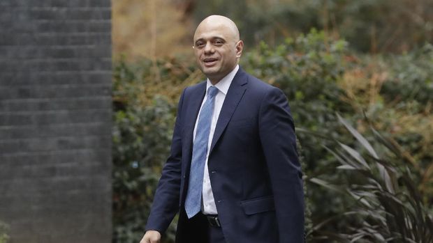 FILE - In this file photo dated Thursday, Feb. 13, 2020, British lawmaker Sajid Javid while he was Chancellor of the Exchequer, walks along Downing Street in London.  Former chancellor of the exchequer Sajid Javid, has been appointed as Secretary of State for Health and Social Care it is announced Saturday June 26, 2021, following the resignation of Matt Hancock. (AP Photo/Matt Dunham, FILE)