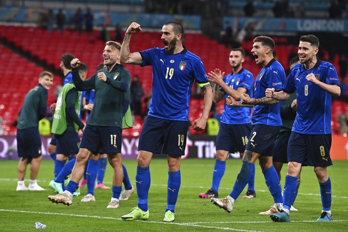 Italia players celebrate end of the Euro 2020 soccer championship round of 16 match between Italy and Austria at Wembley stadium in London in London, Saturday, June 26, 2021. (Ben Stansall/Pool Photo via AP)