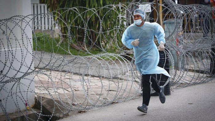 Corona Belum Reda, Malaysia Perpanjang Lockdown Malaysia perpanjang lockdown guna cegah penyebaran virus Corona di kawasannya. Lockdown diperpanjang menyusul kasus COVID-19 harian di negara itu masih tinggi.