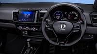 Interior dari Honda City Hatchback Hybrid. Oiya mobil ini juga dibekali sepaket Honda Sensing yang berisikan auto high beam, Road Departure Mitigation System dengan Lane Departure Monitoring System, Lane keeping Assist System, Collision Mitigation Braking System, dan adaptive Cruise Control. Foto: Honda