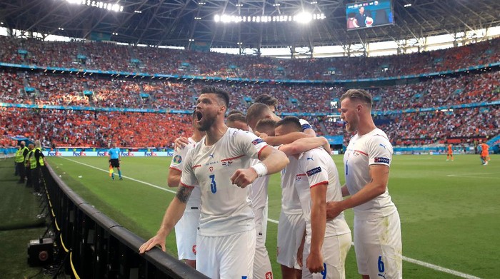 BUDAPEST, HUNGARY - JUNE 27: Ondrej Celustka of Czech Republic celebrates their sides first goal scored by team mate Tomas Holes (obscured) during the UEFA Euro 2020 Championship Round of 16 match between Netherlands and Czech Republic at Puskas Arena on June 27, 2021 in Budapest, Hungary. (Photo by Alex Pantling/Getty Images)
