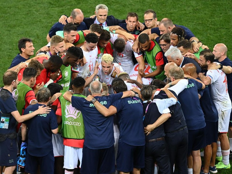 BUCHAREST, ROMANIA - JUNE 28: Granit Xhaka of Switzerland encourages the team before the penalty shoot out in the UEFA Euro 2020 Championship Round of 16 match between France and Switzerland at National Arena on June 28, 2021 in Bucharest, Romania. (Photo by Mihai Barbu - Pool/Getty Images)