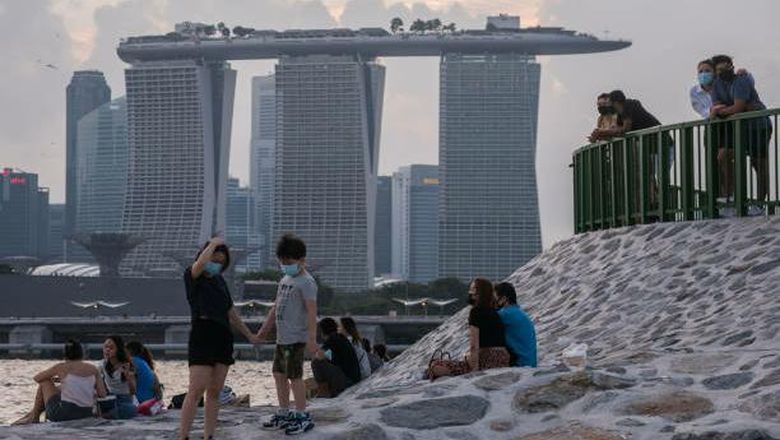 Melihat Singapura yang mencoba berdamai dengan COVID-19