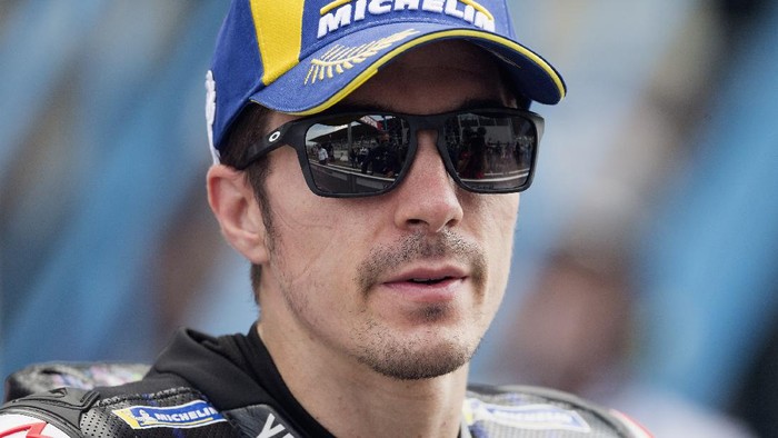 ASSEN, NETHERLANDS - JUNE 27:  Maverick Vinales of Spain and Monster Energy Yamaha MotoGP Team smiles and celebrates the second place under the podium during the MotoGP race during the MotoGP of Netherlands - Race at TT Circuit Assen on June 27, 2021 in Assen, Netherlands. (Photo by Mirco Lazzari gp/Getty Images)