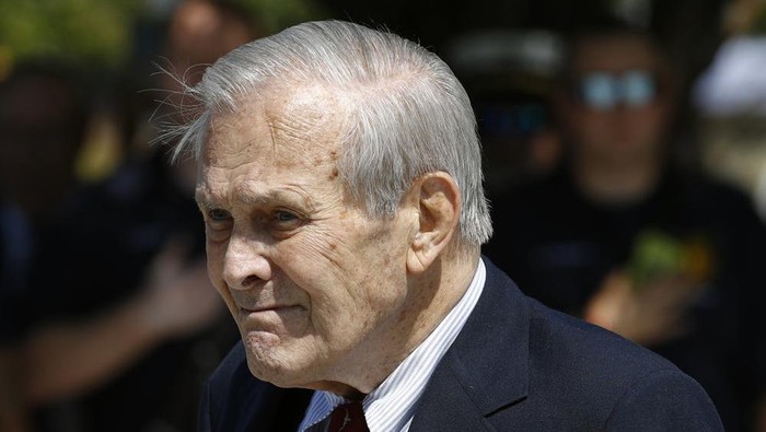 FILE - In this Sept. 11, 2019, file photo, former Defense Secretary Donald Rumsfeld attends a wreath laying ceremony with former President George W. Bush and Defense Secretary Mark Esper on the grounds of the National 9/11 Pentagon Memorial at the Pentagon. The family of Rumsfeld says he has died. He was 88. ( (AP Photo/Patrick Semansky, File)