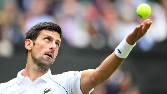LONDON, ENGLAND - JUNE 30: Novak Djokovic of Serbia serves in his Mens Singles Second Round match against Kevin Anderson of South Africa during Day Three of The Championships - Wimbledon 2021 at All England Lawn Tennis and Croquet Club on June 30, 2021 in London, England. (Photo by Mike Hewitt/Getty Images)