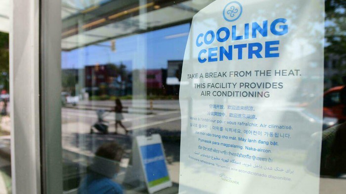 A welcoming sign is seen on the door of the Hillcrest Community Centre, where people can cool off during the extreme hot weather in Vancouver, British Columbia, Canada Don MacKinnon AFP