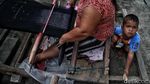 Menjaga Kelestarian Sarung Batak Khas Toba