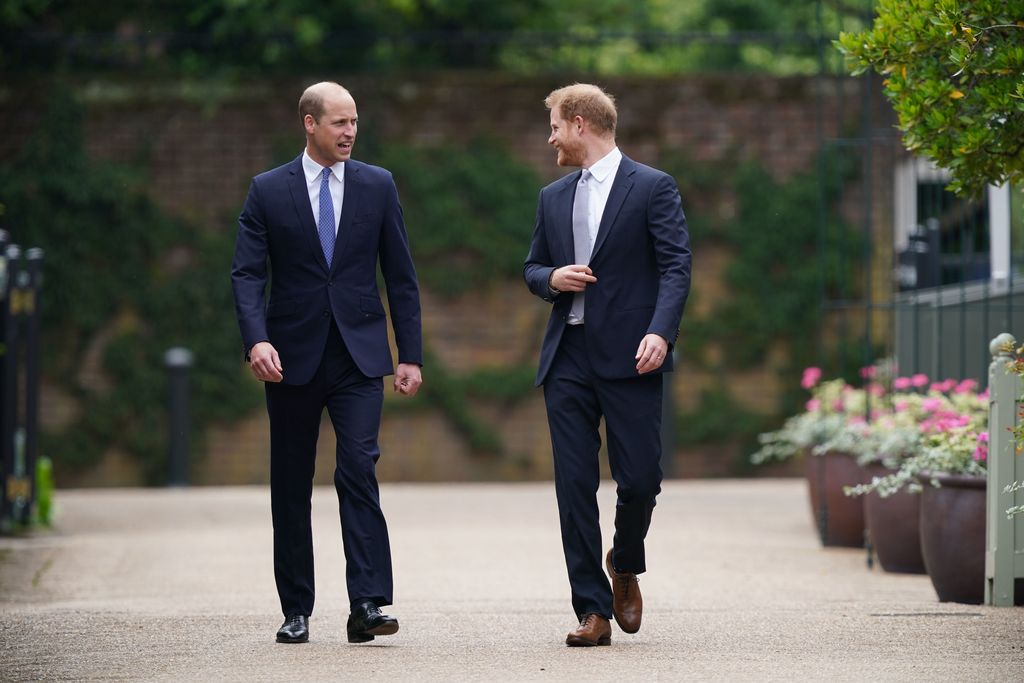 LONDON, ENGLAND - JULY 01: Prince William, Duke of Cambridge (left) and Prince Harry, Duke of Sussex unveil a statue they commissioned of their mother Diana, Princess of Wales, in the Sunken Garden at Kensington Palace, on what would have been her 60th birthday on July 1, 2021 in London, England. Today would have been the 60th birthday of Princess Diana, who died in 1997. At a ceremony here today, her sons Prince William and Prince Harry, the Duke of Cambridge and the Duke of Sussex respectively, will unveil a statue in her memory. (Photo by Dominic Lipinski - WPA Pool/Getty Images)