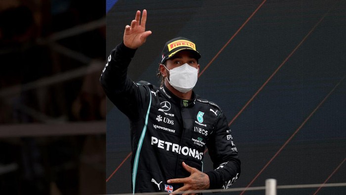 Lewis Hamilton LE CASTELLET, FRANCE - JUNE 20: Second placed Lewis Hamilton of Great Britain and Mercedes GP celebrates on the podium during the F1 Grand Prix of France at Circuit Paul Ricard on June 20, 2021 in Le Castellet, France. (Photo by Clive Rose/Getty Images)