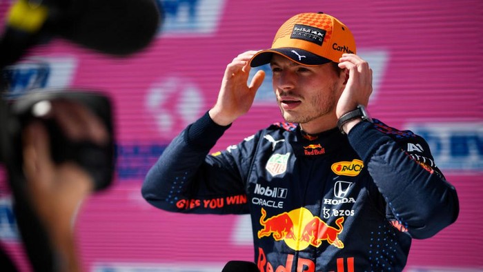 SPIELBERG, AUSTRIA - JULY 03: Pole position qualifier Max Verstappen of Netherlands and Red Bull Racing talks to the media in parc ferme during qualifying ahead of the F1 Grand Prix of Austria at Red Bull Ring on July 03, 2021 in Spielberg, Austria. (Photo by Christian Bruna - Pool/Getty Images)