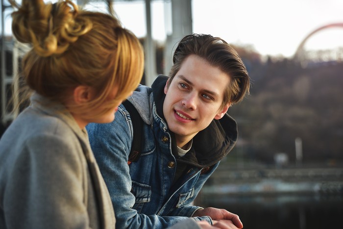 Young beautiful couple enjoying their time. Man and woman laugh and talk