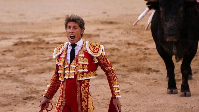 People keep a social distance while attending a bullfight amid the coronavirus pandemic at Las Ventas bullring in Madrid, Spain, Saturday, June 26, 2021. (AP Photo/Manu Fernandez)
