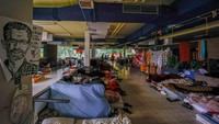 Banyak yang telah tinggal dan bekerja di Belgia selama bertahun-tahun, tetapi mereka menuntut status hukum untuk memiliki jaminan sosial dan kondisi kehidupan yang lebih baik.(Olivier Matthys/Getty Images)