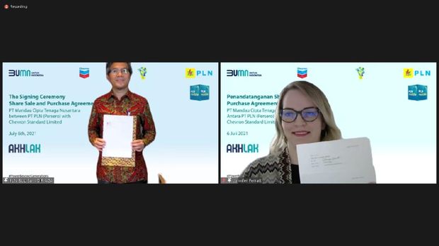 PLT tandatangan jual beli saham (SPA) dengan Chevron Standard Limited (CSL). (Dok: PLN)