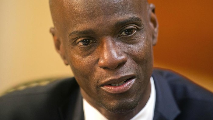 FILE - In this Feb. 7, 2020, file photo, Haitis President Jovenel Moise speaks during an interview at his home in Petion-Ville, a suburb of Port-au-Prince, Haiti. Sources say Moise was assassinated at home, first lady hospitalized amid political instability. (AP Photo/Dieu Nalio Chery, File)